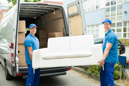 Professional packing team organising boxes in a Finchley home