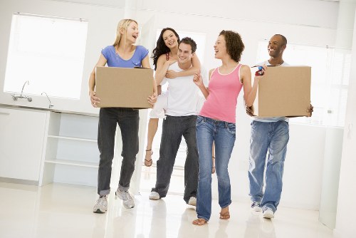 Packed moving boxes prepared for transport in Finchley