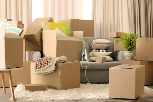 Packed office boxes and furniture ready for a business move