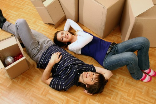 House moving boxes and furniture being loaded by local removalists in Finchley