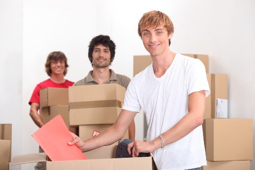 Loading household items into a moving van in Finchley